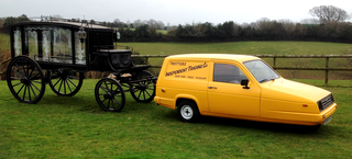 Horse-Drawn Hearse hitched to Yellow Reliant Three-Wheeler